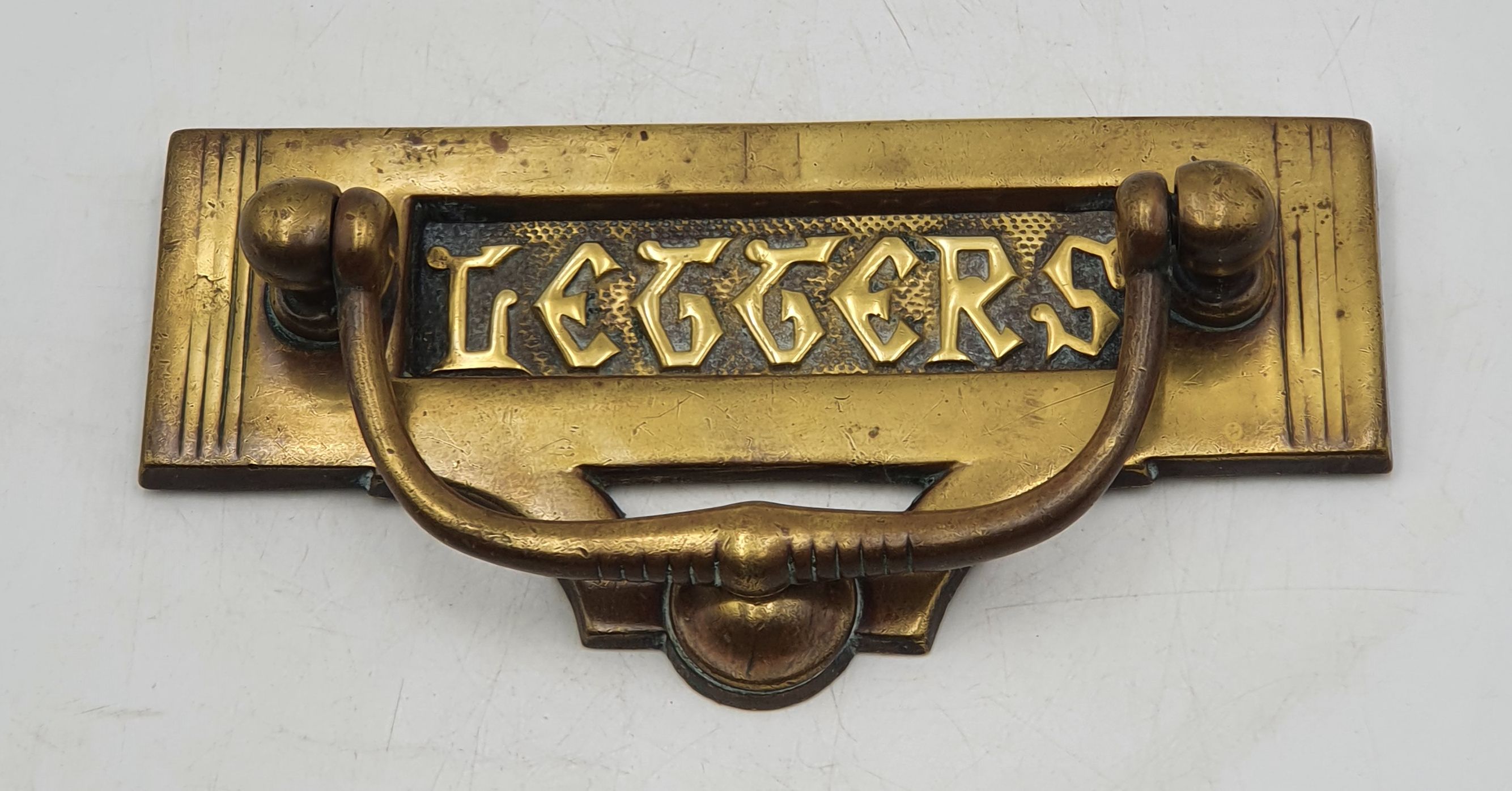 A Brass Art Nouveau Style Door Knocker And Letter Plate