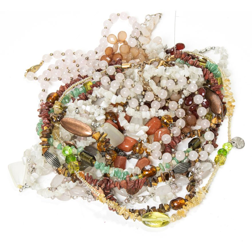 A group of bead necklaces