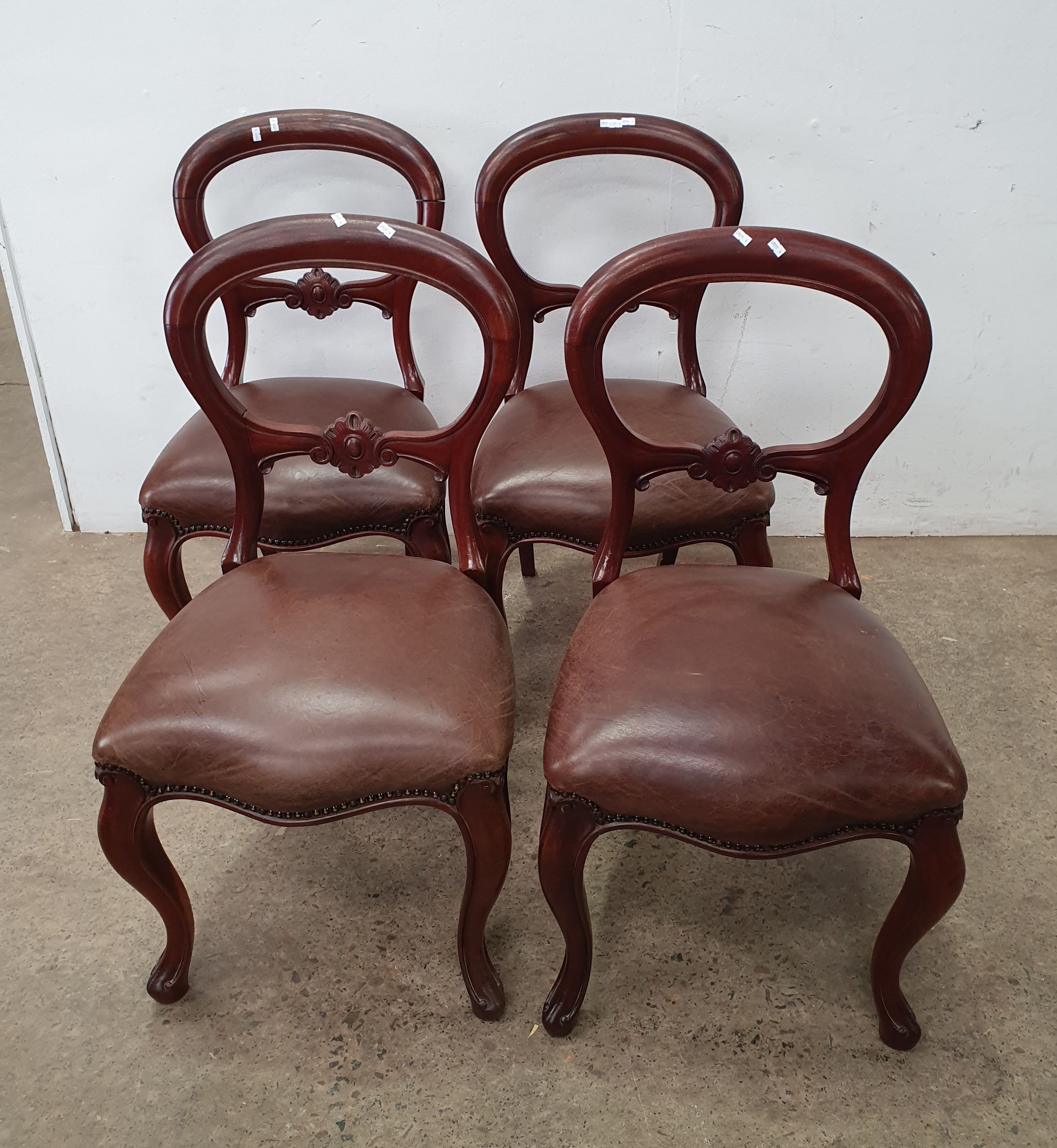 A Set Of Four Victorian Style Balloon Back Chairs