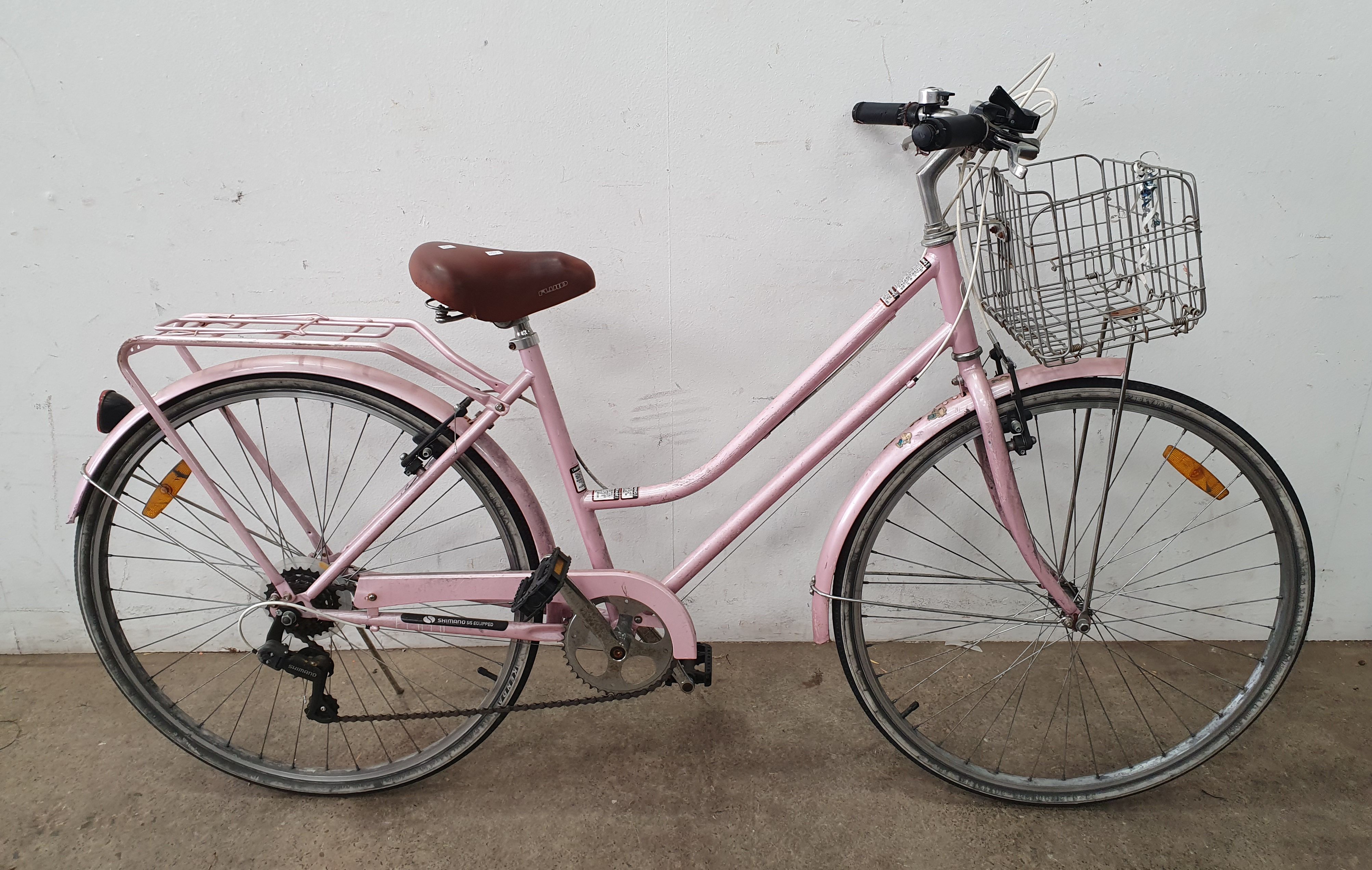 A LADIES PINK BICYCLE