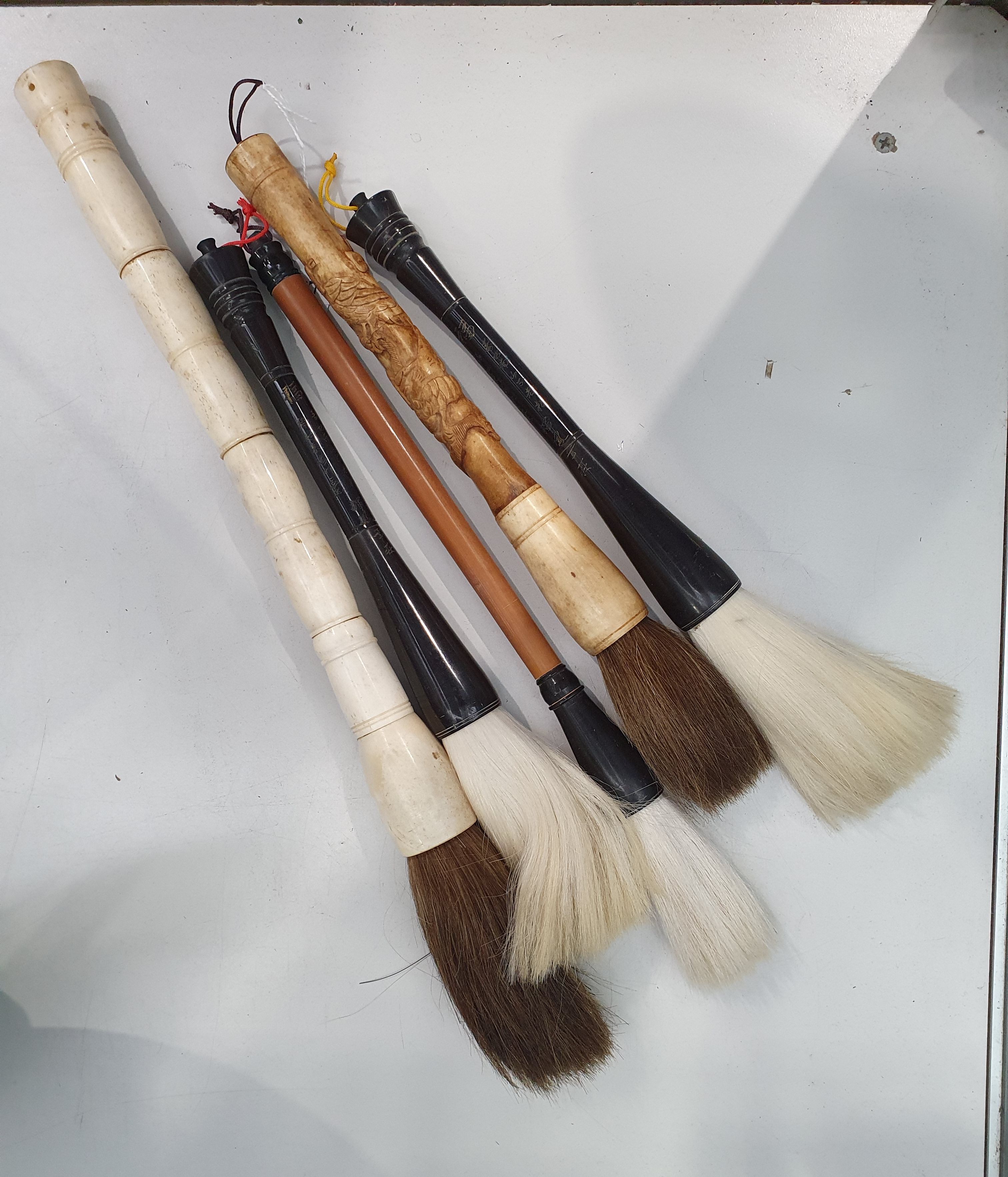 571 · FIVE VARIOUS CHINESE CARVED CALLIGRAPHY BRUSHES