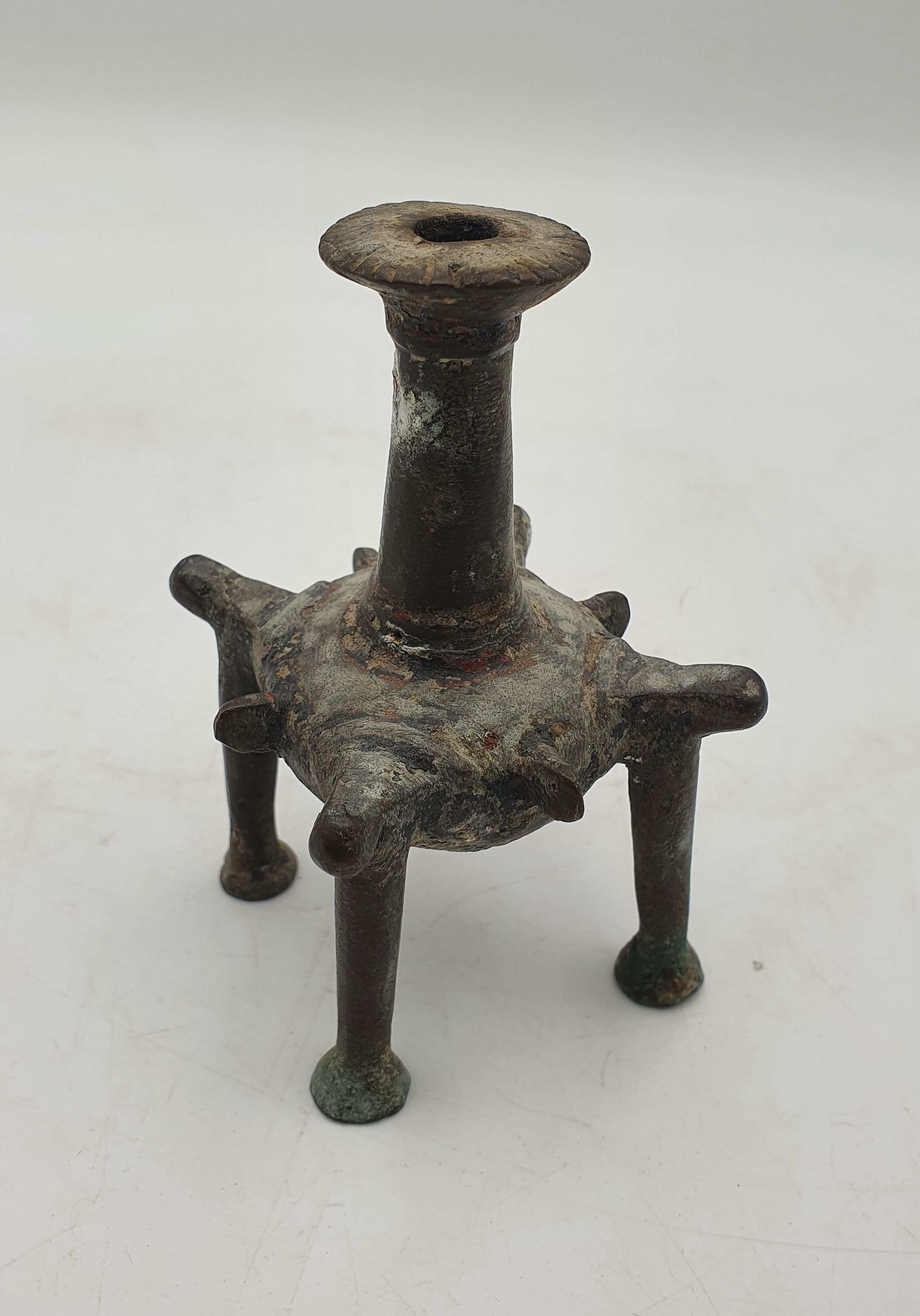 327 · AN ANCIENT PERSIAN BRONZE KOHL STAND