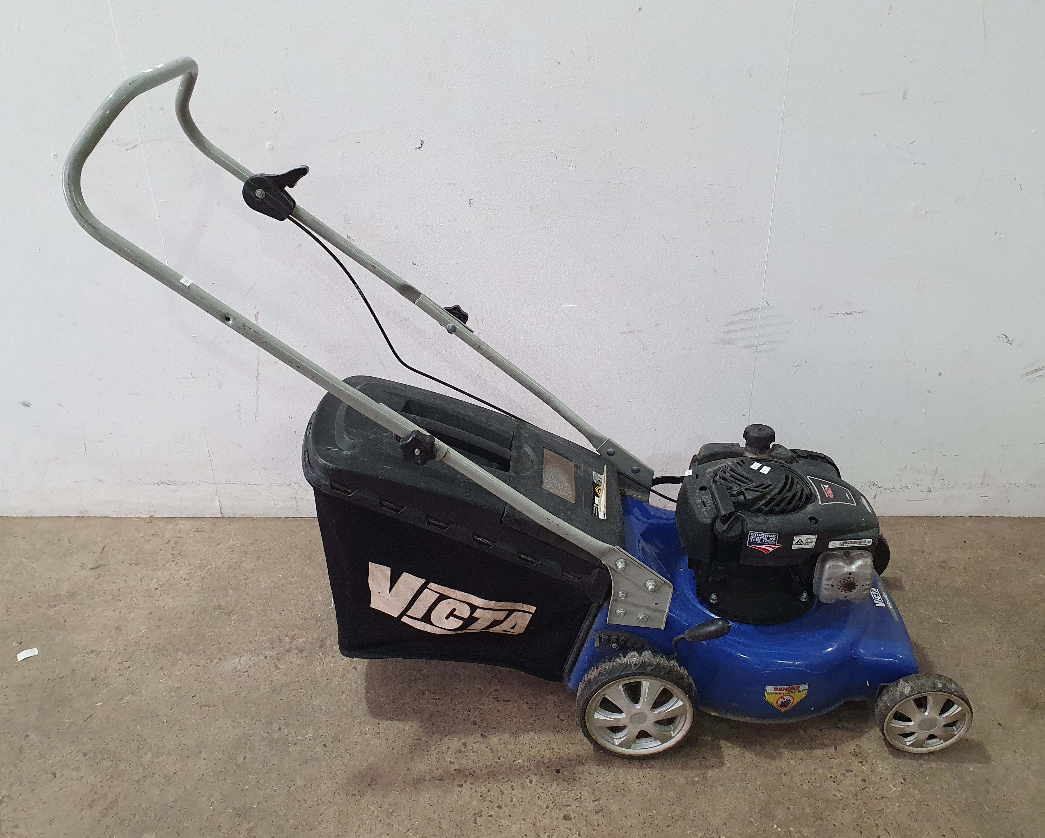 A Victa Ultralite Petrol Mower