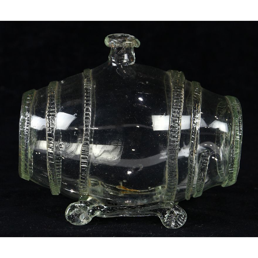 Early blown glass whiskey decanter, having a barrel form with applied feet, 6"h