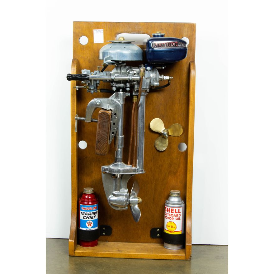 A fully restored Neptune canoe motor