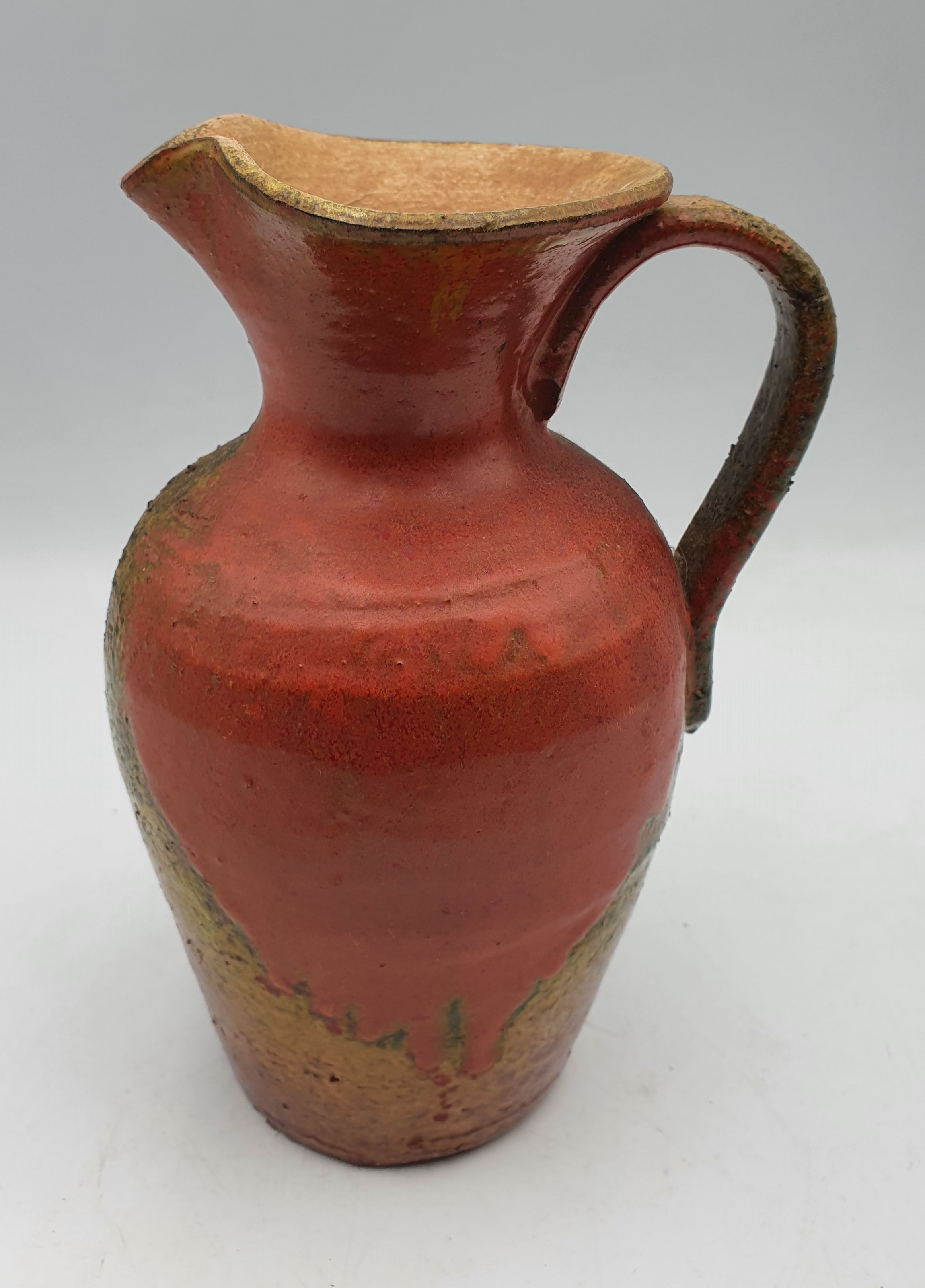 223 · AN ITALIAN POTTERY JUG/VASE