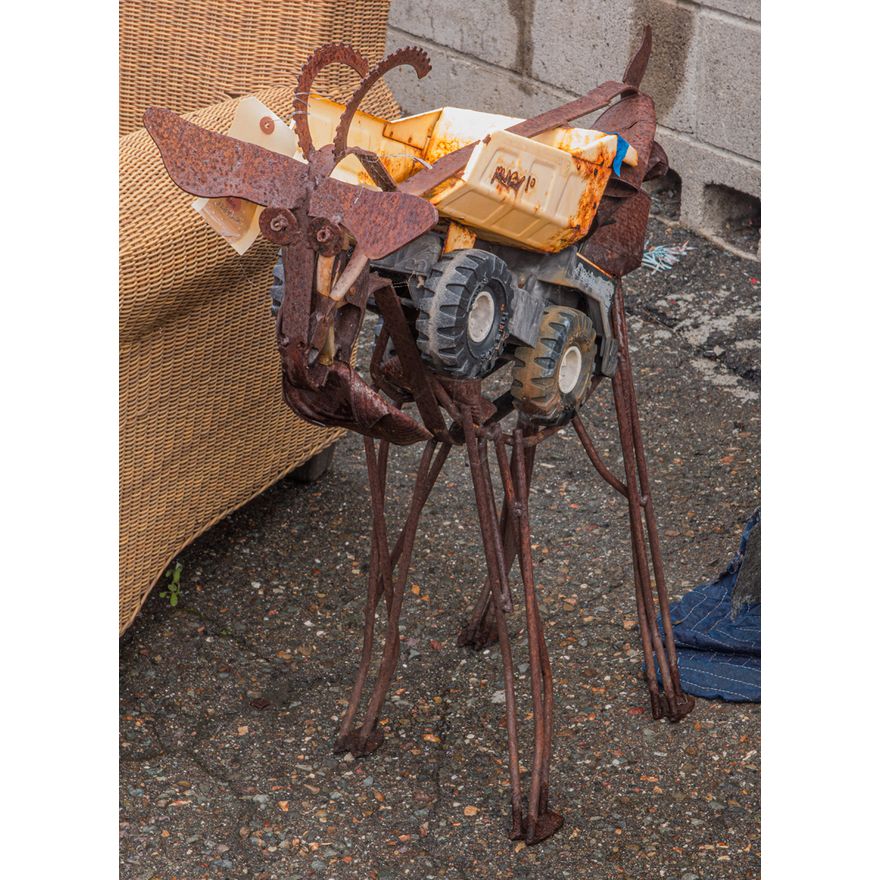 Brutalist weldeded figure of a goat with found objects
