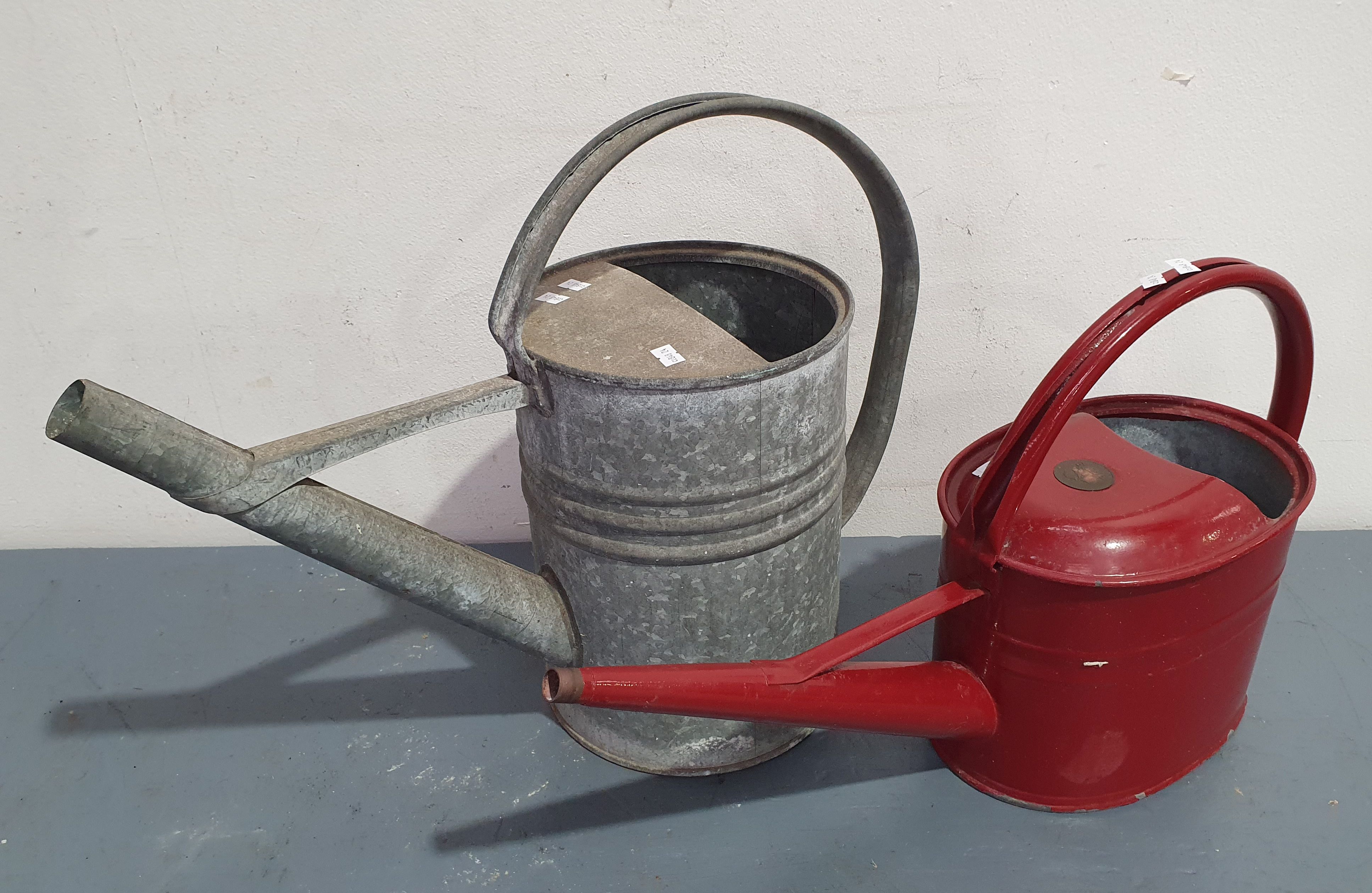 1148 · TWO VARIOUS WATERING CANS