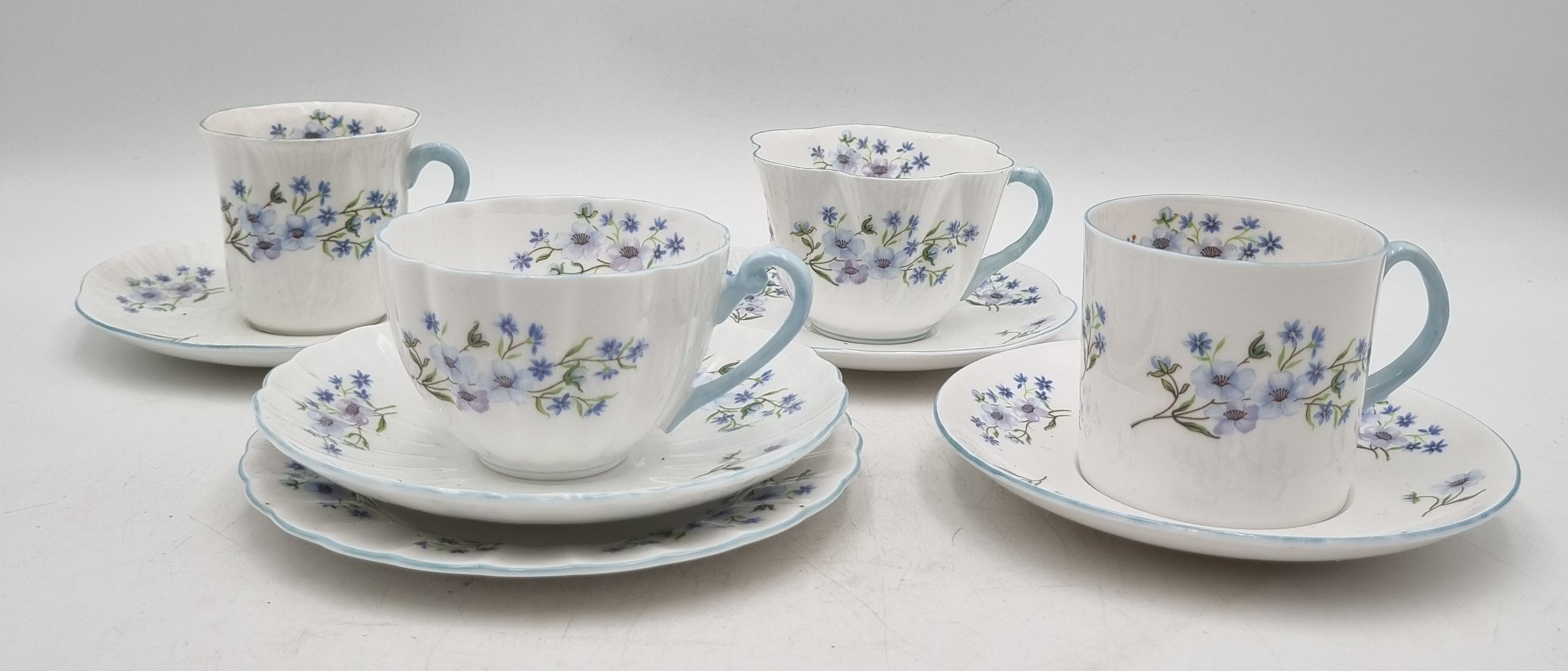 631 · A COLLECTION OF SHELLEY FINE BONE CHINA IN THE "BLUE ROCK" DESIGN