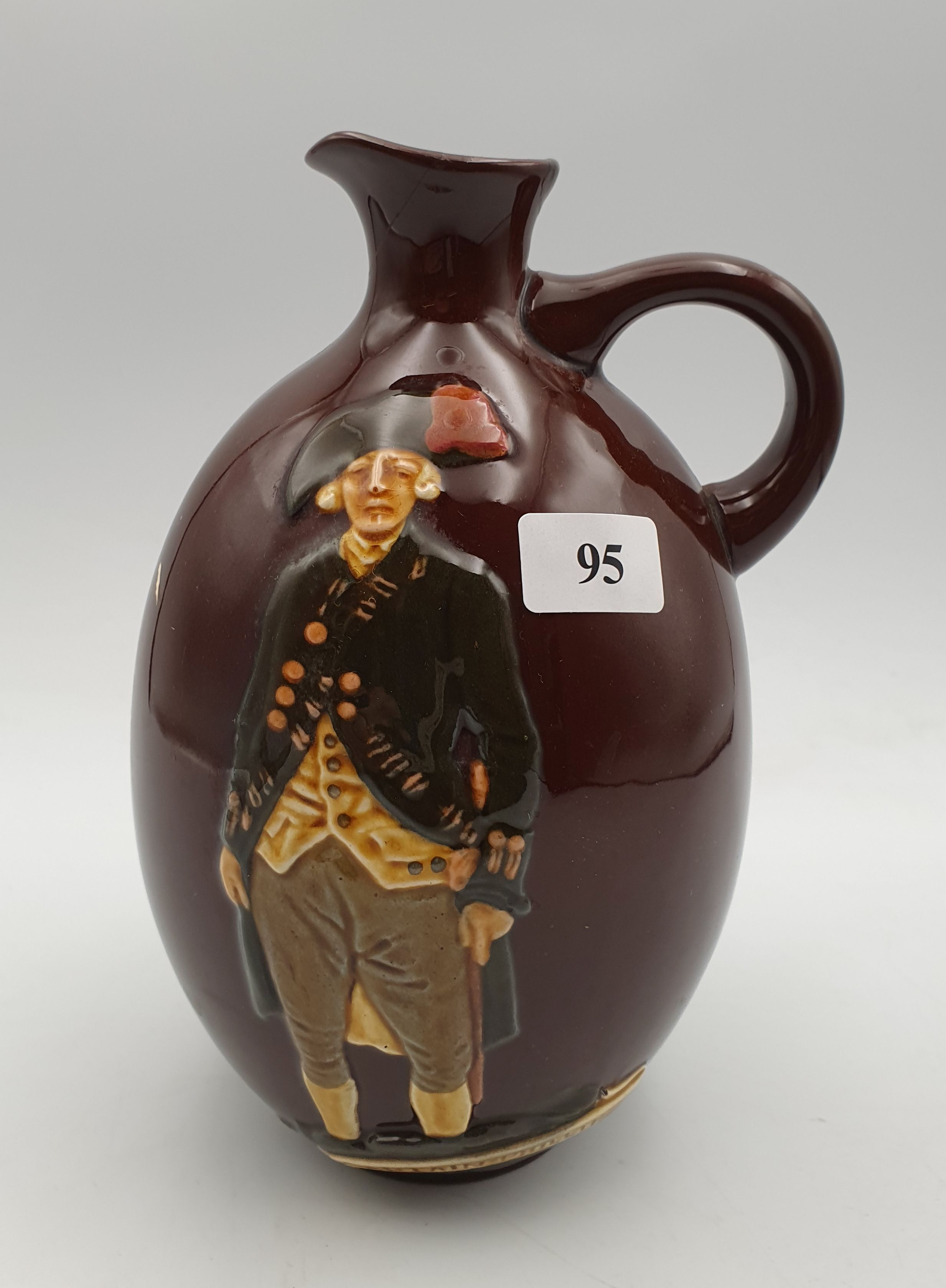 A ROYAL DOULTON CAPTAIN PHILLIP DEWAR'S WHISKY NOGGIN