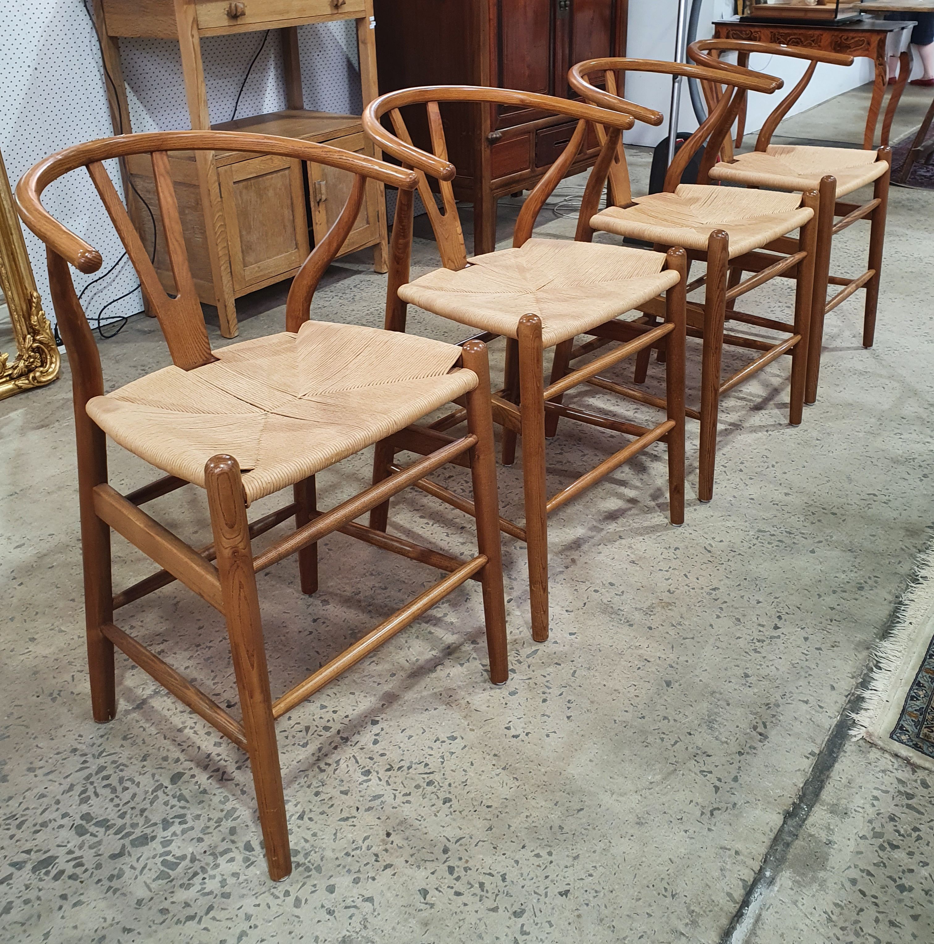 2006 · A SET OF FOUR WISHBONE STOOLS
