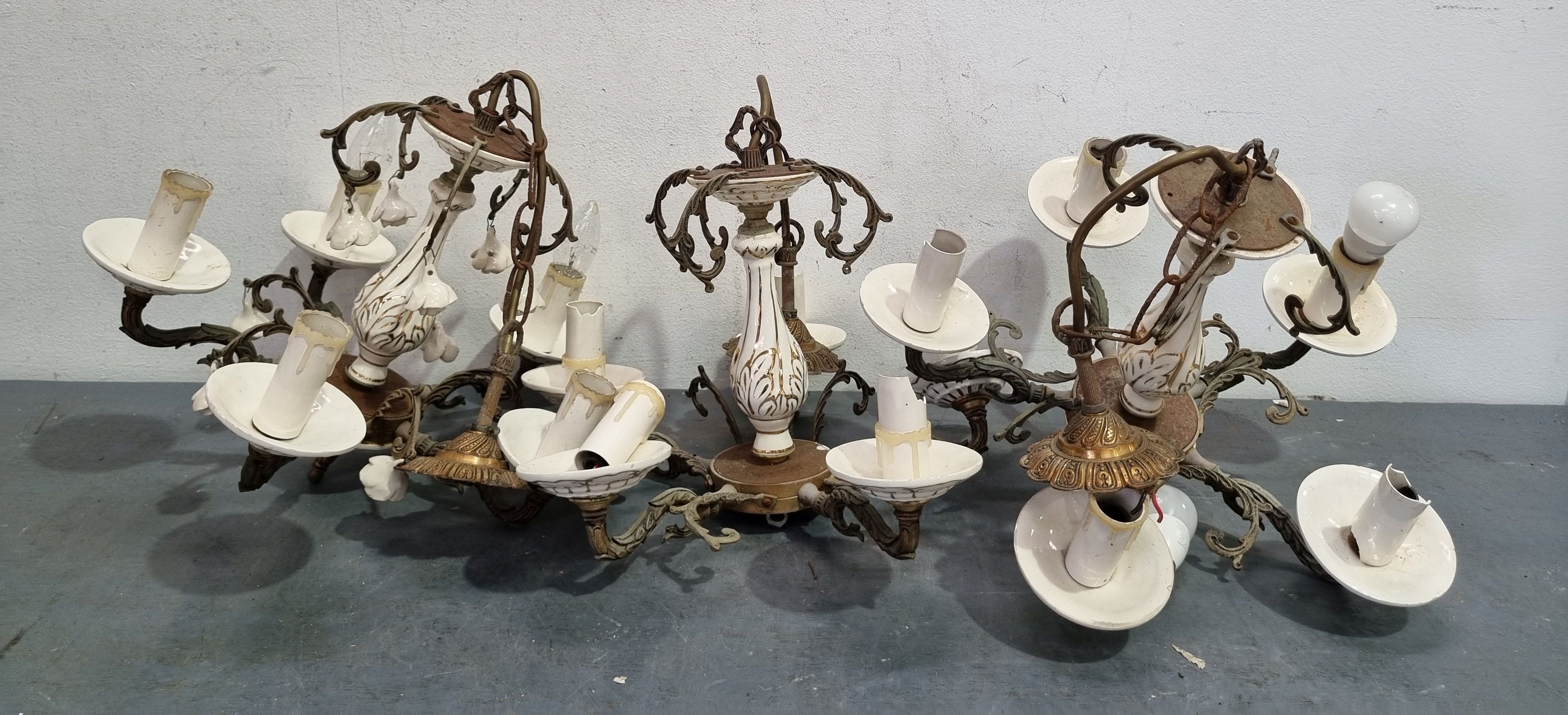 A Set Of Three Metal And Ceramic Chandeliers