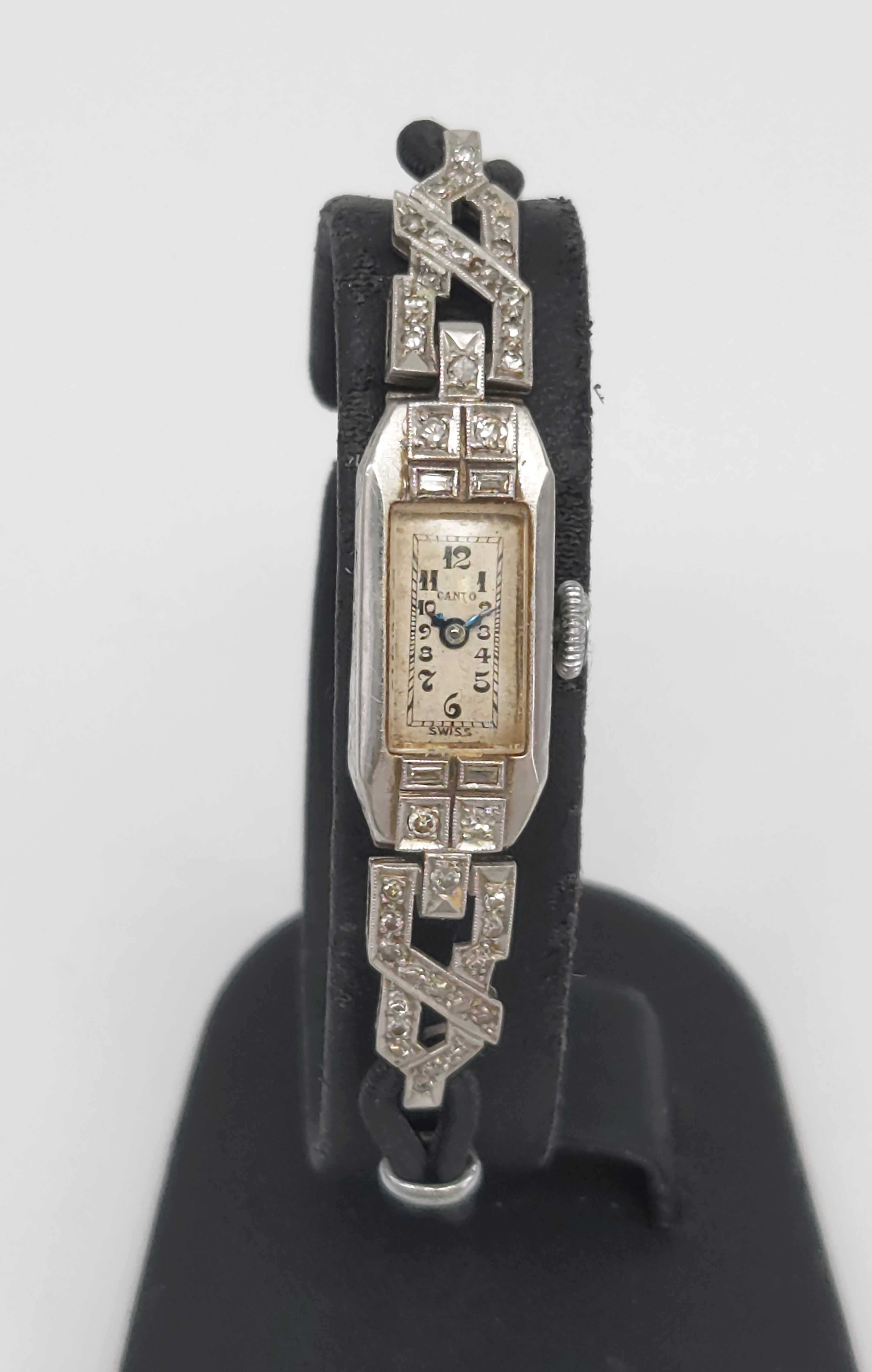 An Art Deco Platinum And Diamond Cocktail Watch