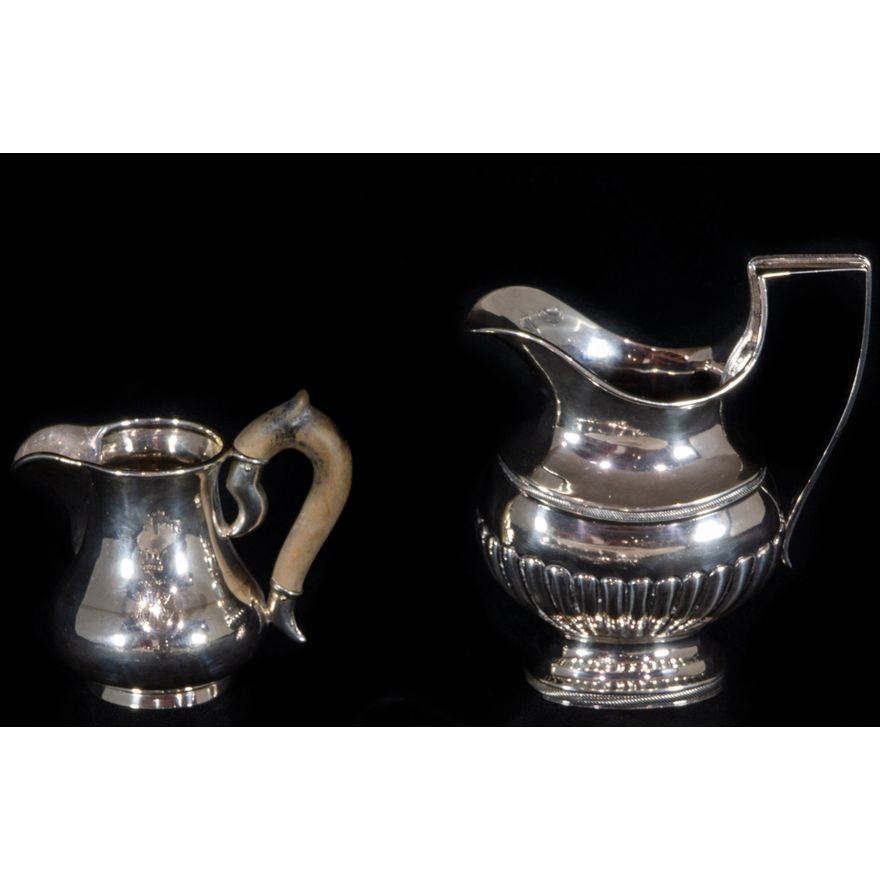 Two European silver creamers