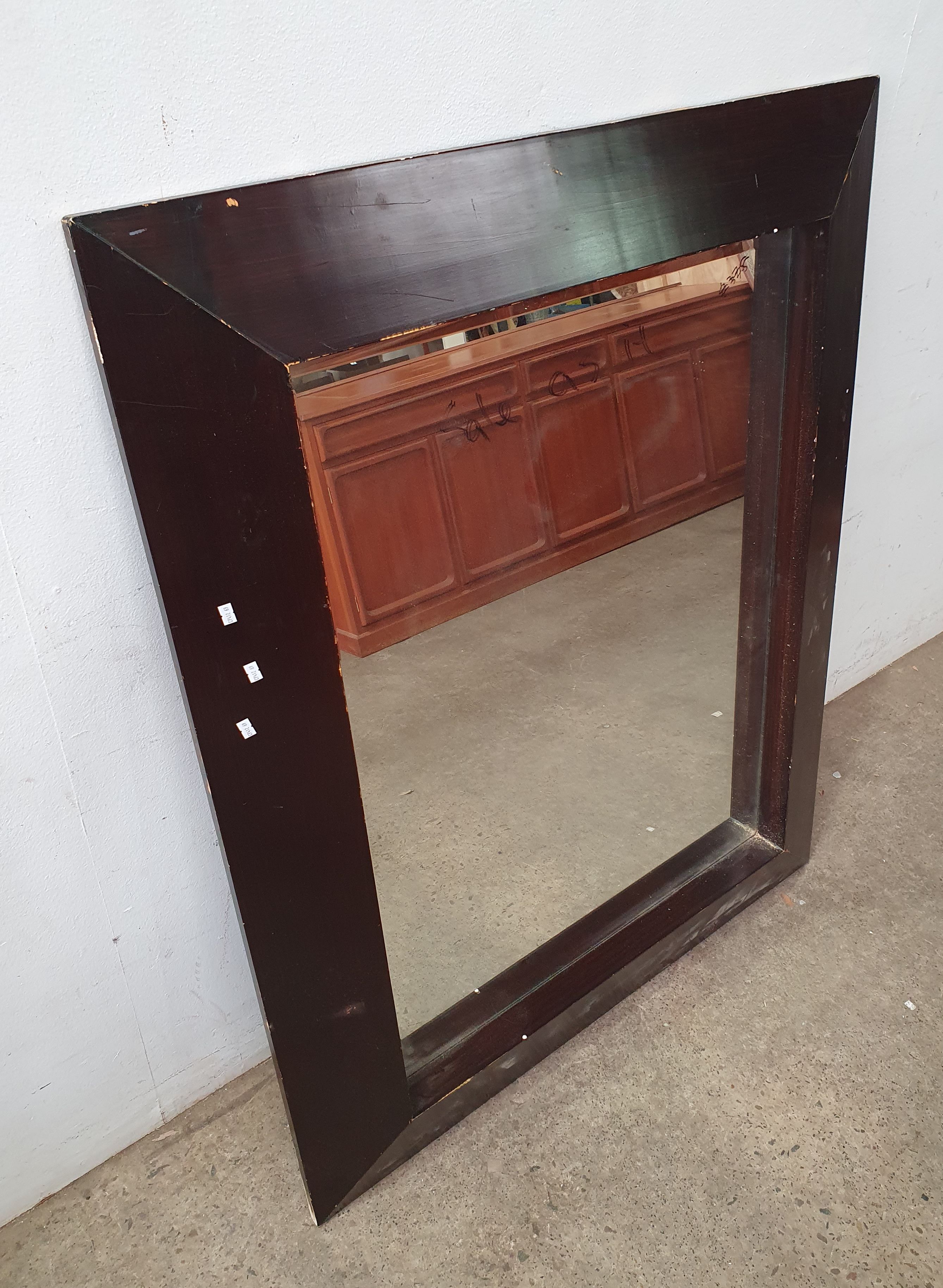 A Framed Bevelled Mirror