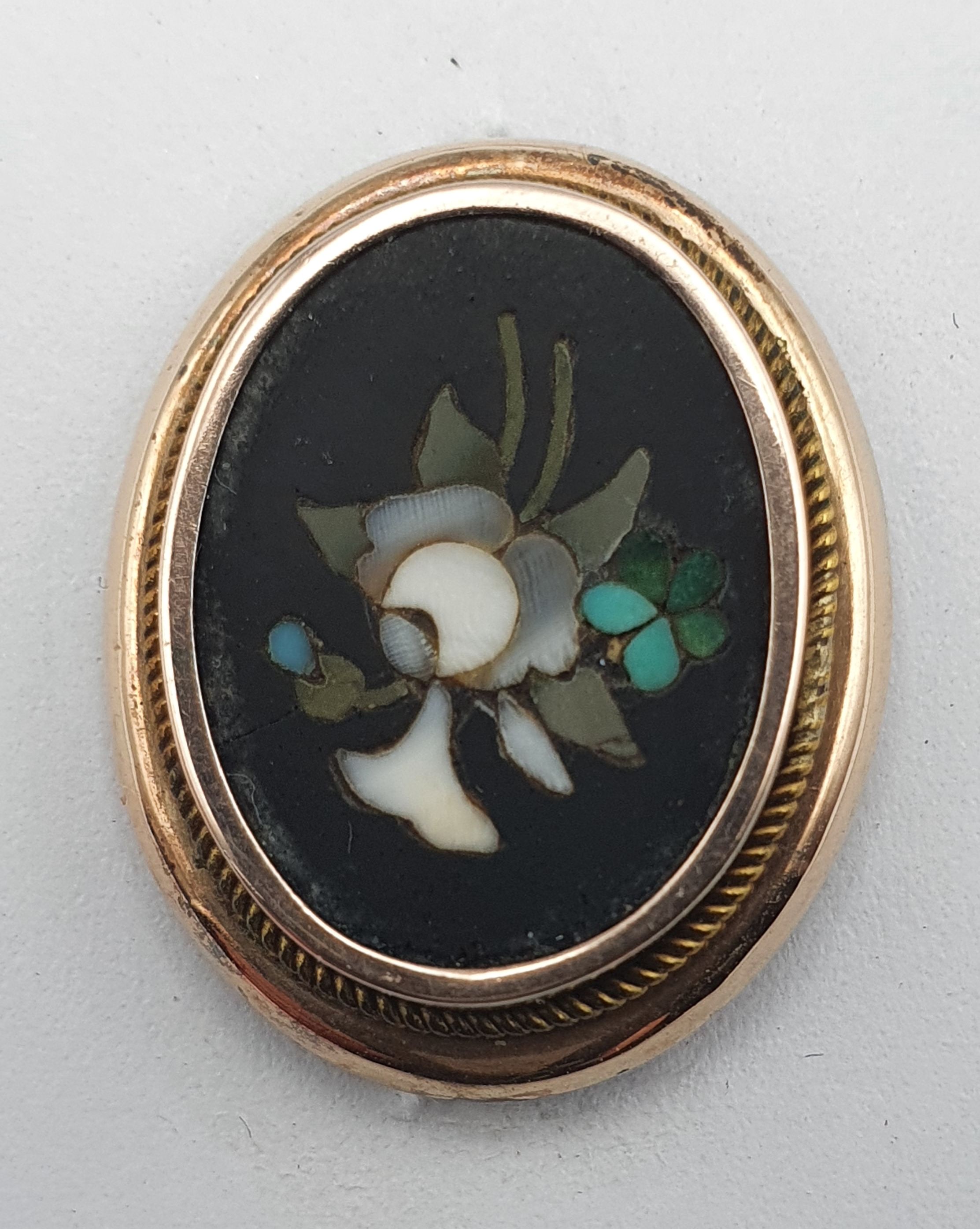 312 · A VICTORIAN PIETERA DURA BROOCH