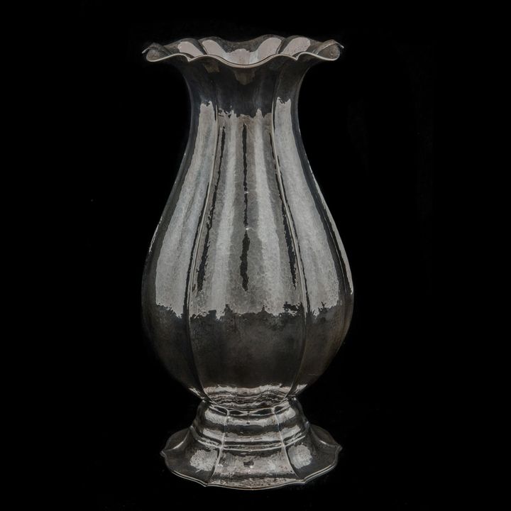 A Buccellati hand wrought sterling lotus form vase