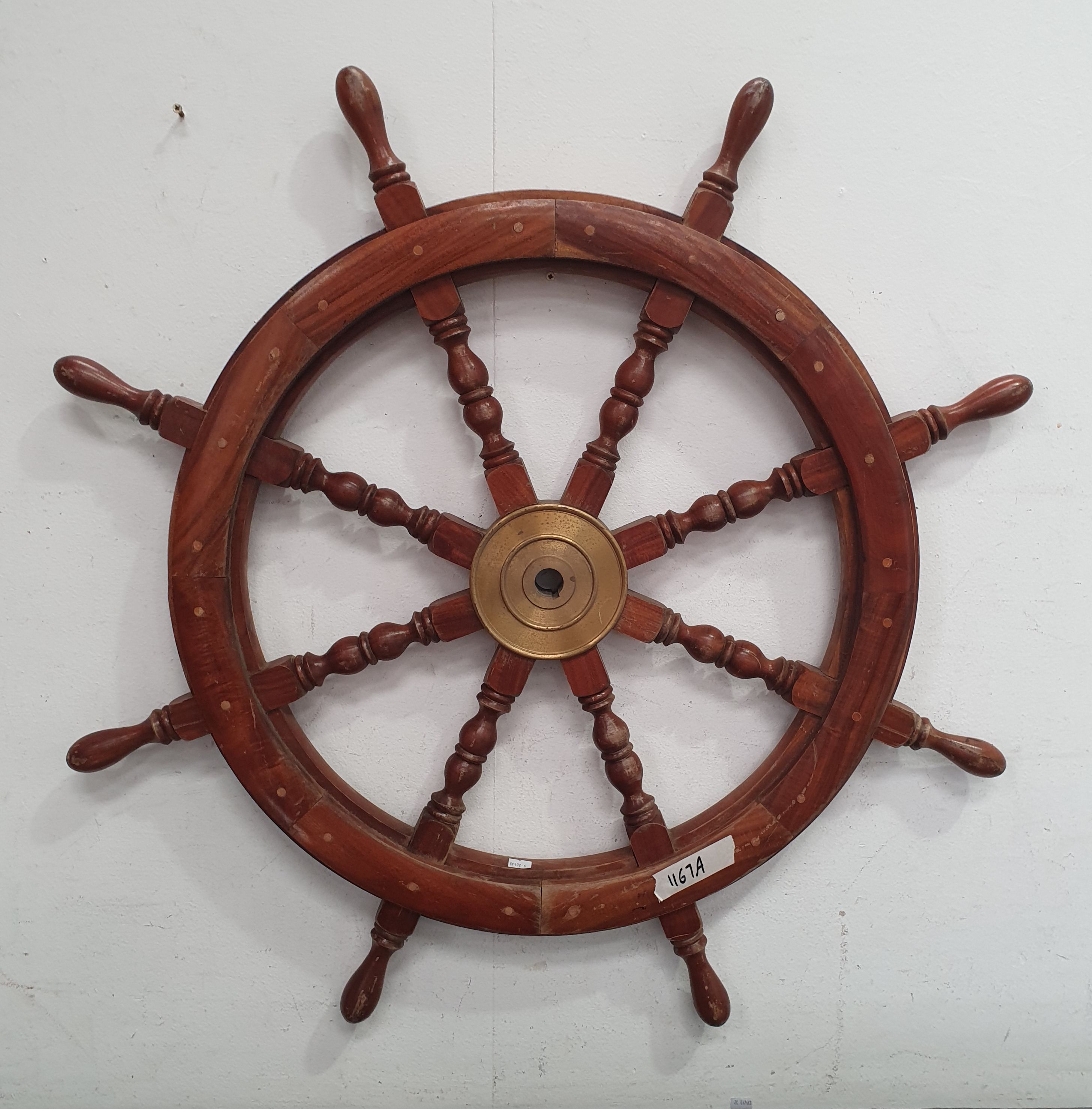 1167A · A WOODEN SHIPS WHEEL