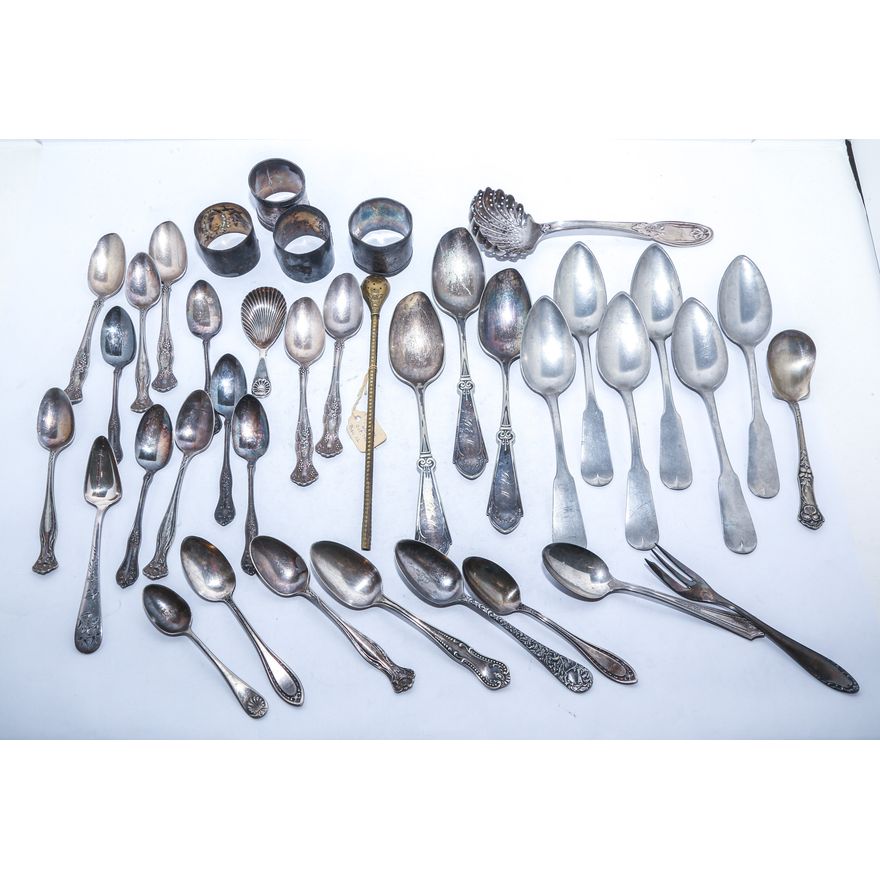 Group of Silver Plated Flatware & Four Napkin Rings