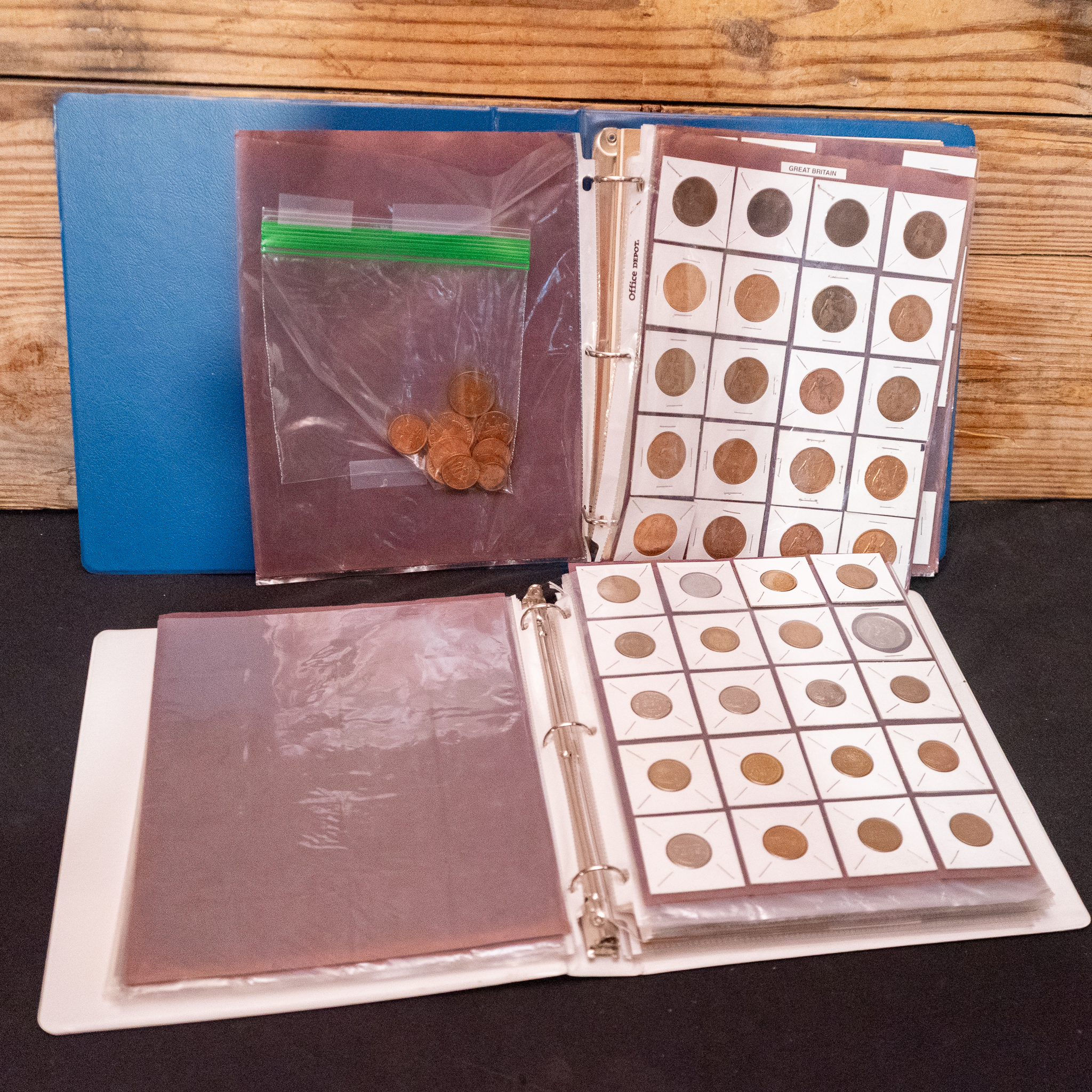Two Binders of Tokens and Foreign Coins | Harritt Group, Inc