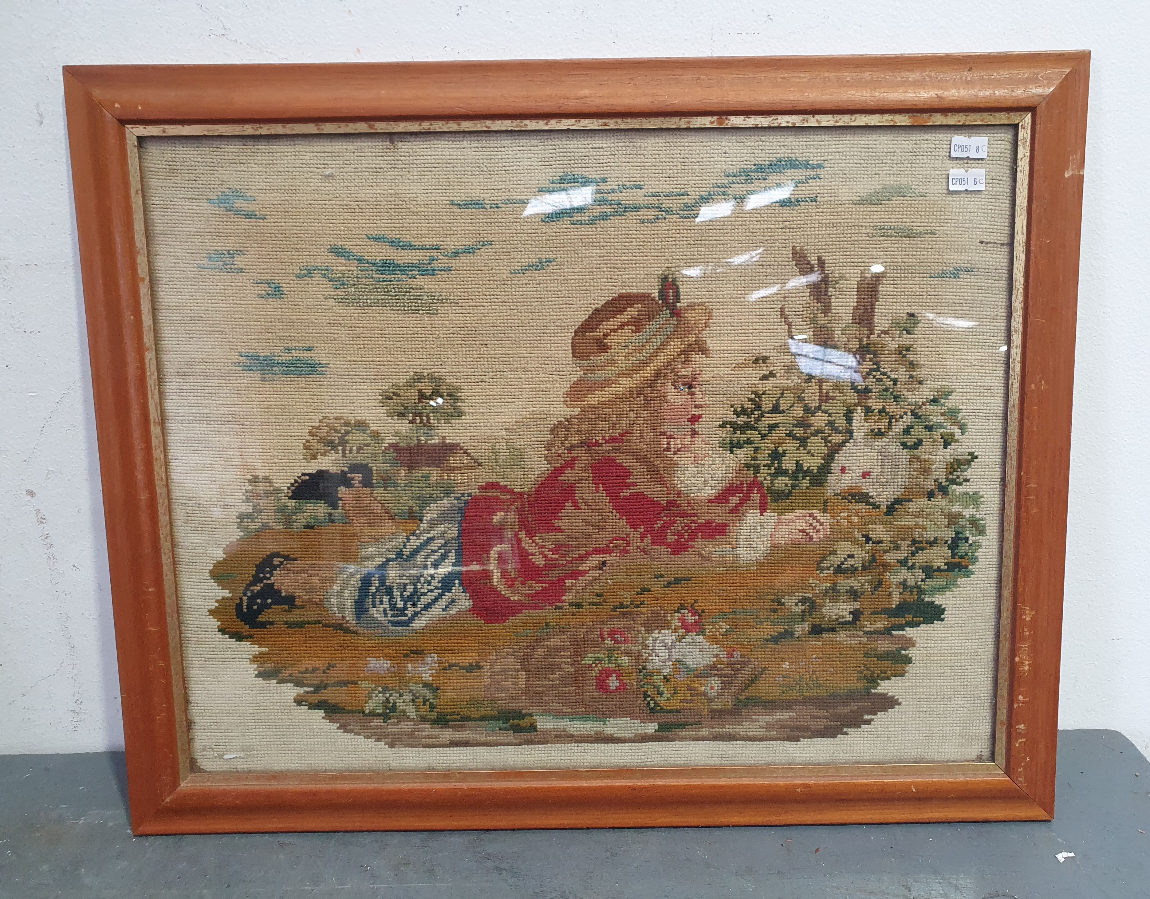 A Framed Woolwork Tapestry