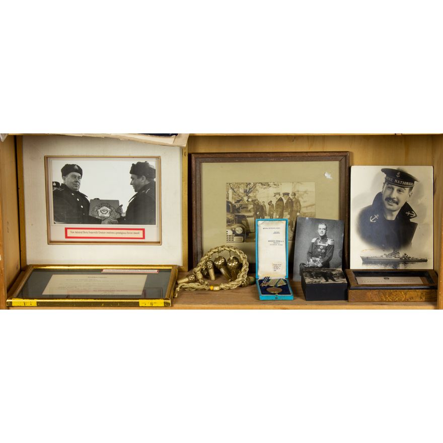 Shelf lot of framed military photos, awards and a Yugoslovia Order ot Sava Knight V
